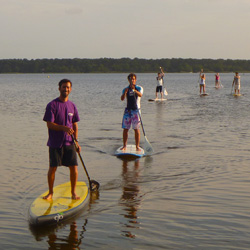 Location et balade en SUP stand up paddle sur le lac de lacanau moutchic France